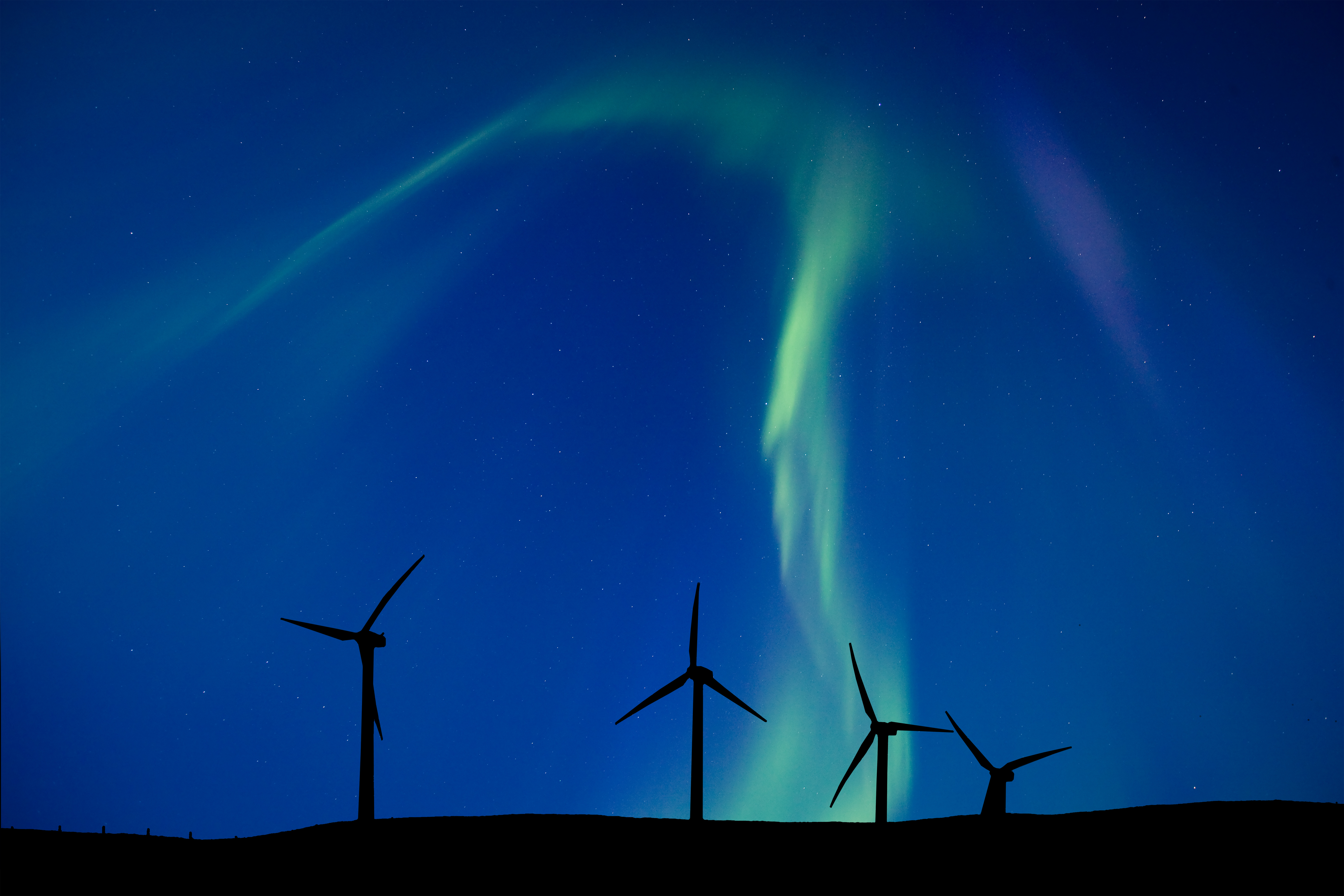 Wind turbines and the night sky